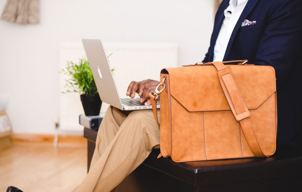 Why do some holidaymakers like to dress to impress?