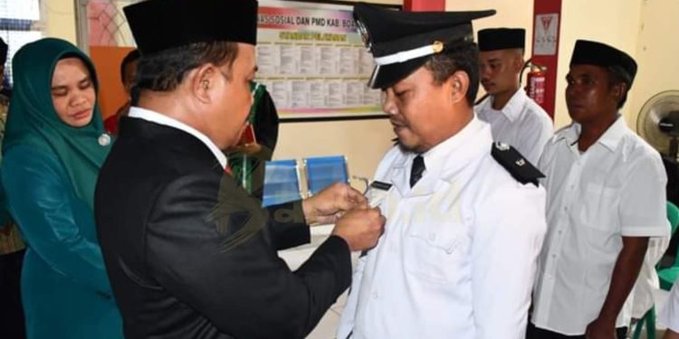 Sherman Moridu Resmi Lantik Heriyanto Guzali sebagai Penjabat Kades Lahumbo, Persiapan Pilkades Menjadi Prioritas
