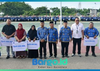 Apel Korpri, Wabup Iwan Adam Serahkan Santunan dan Beasiswa untuk Keluarga ASN Meninggal Dunia