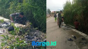 Cegah Banjir di Musim Hujan, Babinsa Koramil Kota Barat Bersama Warga Bersihkan Selokan