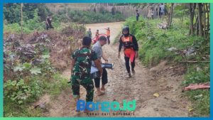 Babinsa Koramil 1313-02/Marisa Turun Langsung Cari Korban Tenggelam di Sungai Pasar Marisa