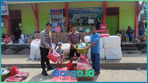 Penyaluran Bantuan Banjir di Desa Tuweya Berlangsung Lancar, Kapolres Pohuwato Apresiasi Peran Bhabinkamtibmas