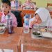 Program Makan Siang Bergizi PT Merdeka Copper Gold Berdampak Positif di Pohuwato, 80 Persen Siswa Alami Peningkatan Gizi
