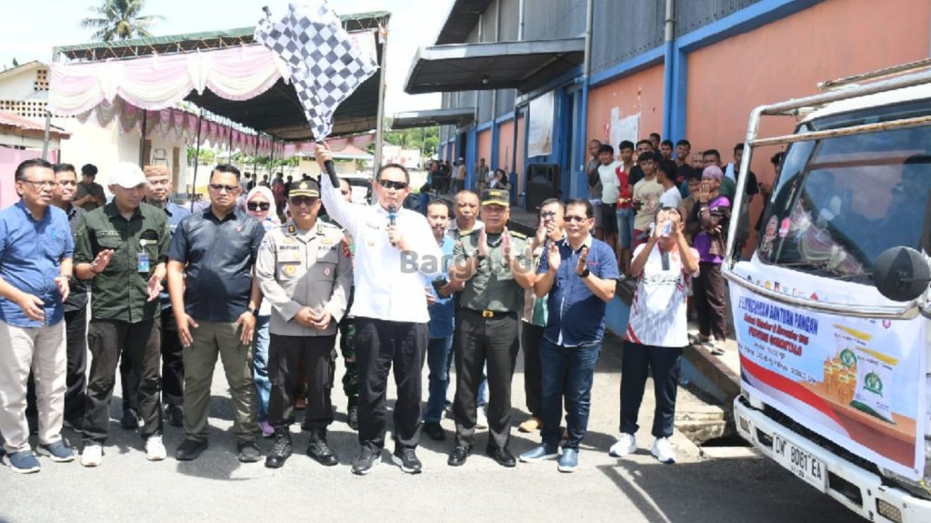 Kasrem 133/NW Hadiri Launching Distribusi Bantuan Pangan Beras Pemerintah dan Minyak Kita
