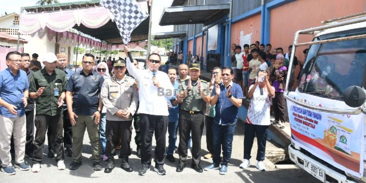 Kasrem 133/NW Hadiri Launching Distribusi Bantuan Pangan Beras Pemerintah dan Minyak Kita