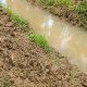 Atasi Sedimentasi, IR Team Normalisasi Irigasi di Molamahu, Aliran Air ke Sawah Kembali Lancar